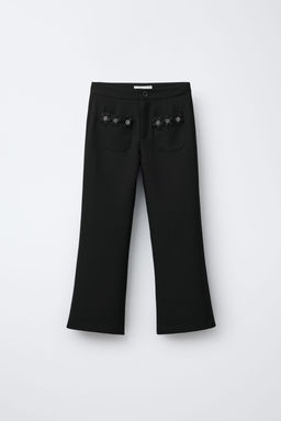 TROUSERS WITH FLORAL JEWEL DETAILS