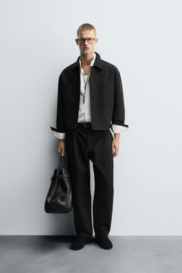 RELAXED FIT PLEATED TROUSERS