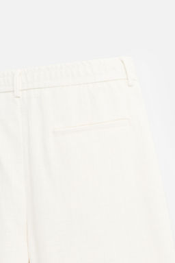 TEXTURED REGULAR FIT TROUSERS - Zara фото 40
