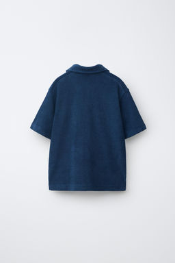 CONJUNTO POLO Y BERMUDA EFECTO TOALLA / Azul