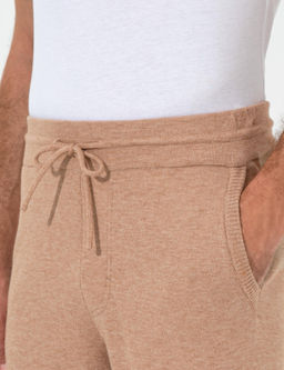 Бежевые зауженные брюки из эластичного трикотажа - Cacharel фото 6