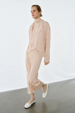 JERSEY PUNTO LAZO EFECTO ARRUGADO / rosa claro