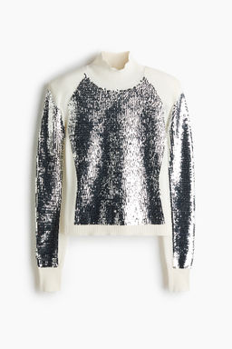 Top de lentejuelas con hombreras