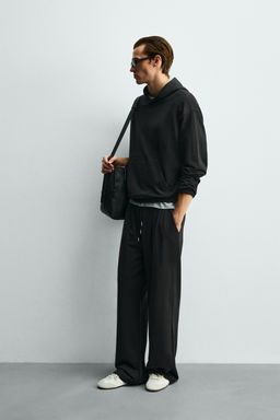 PANTAL?N JOGGER PLIEGUES SOFT / Negro