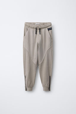 JOGGER TROUSERS WITH ZIPS