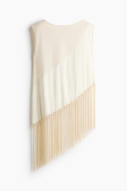 Top asim?trico con flecos