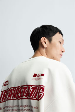 PRINTED SLOGAN SWEATSHIRT