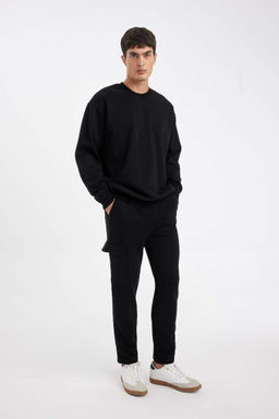 Мужские черные приталенные спортивные брюки с карманами-карго и прямыми штанинами - Defacto фото 2