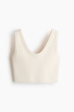 Top cropped sin mangas en punto fino