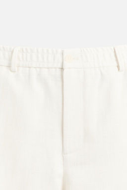 TEXTURED REGULAR FIT TROUSERS - Zara фото 9