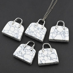 Оригинальная подвеска с кахолонгом искусственным в форме сумочки 25*10*27мм.