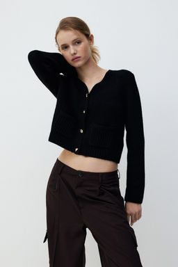 Cardigan corto en punto fino