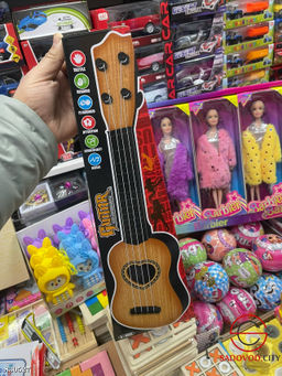 Игрушечная детская гитара