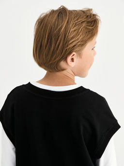 Черный жилет