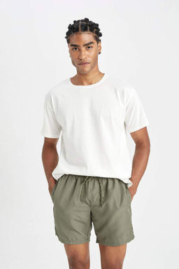 Шорты для плавания выше колена стандартного кроя на сетчатой подкладке