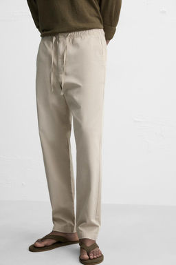REGULAR FIT JOGGER WAIST TROUSERS - Zara фото 25