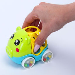 Машинка - погремушка Крошка Я «Свинка», с эластичными элементами