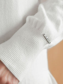 D39.350 Джемпер женский натуральный белый