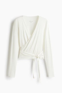 Top de deporte cruzado en modal - H&m фото 2