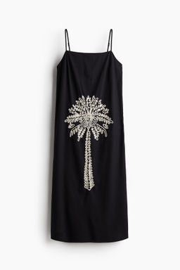 Vestido de tirantes con motivo bordado