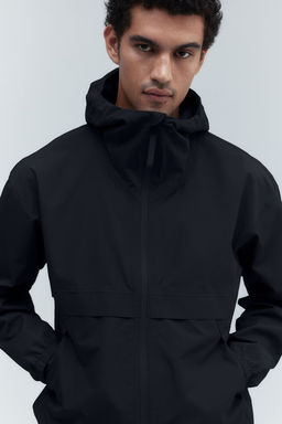 Chubasquero unisex en StormMove - H&m фото 7