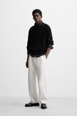 TEXTURED OPEN-KNIT SWEATER