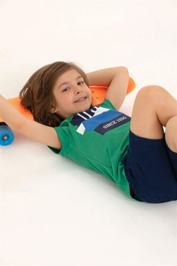 Детская зеленая футболка с круглым вырезом Неожиданная скидка в корзине