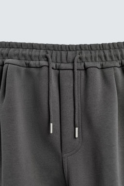 NEOPRENE-EFFECT PLEATED CARGO TROUSERS - Zara фото 7
