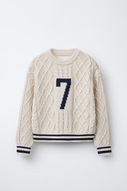 CABLE-KNIT SWEATER