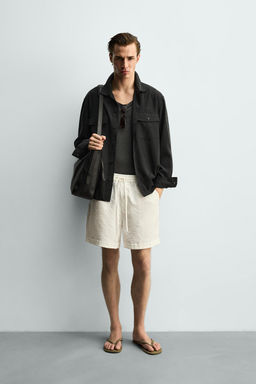 BERMUDA FLUIDA RELAXED FIT / Blanco roto