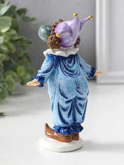 Сувенир полистоун "Клоун надувает шарик" сине-фиолетовый 16,5 см