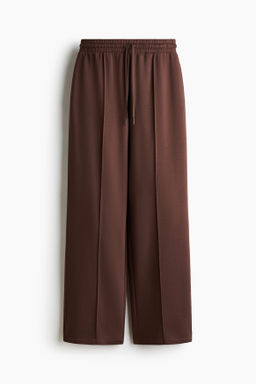 Joggers amplios con raya