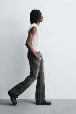 RIPPED BELL BOTTOM FIT JEANS