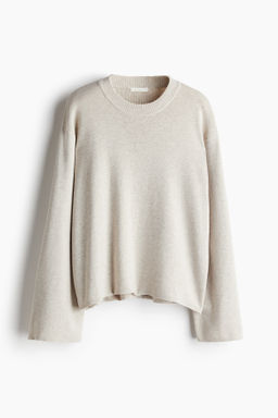 Jersey oversize con bajo redondeado