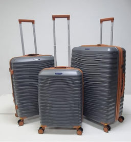 Набор из 3-х чемоданов с расширением 11184 Серый
