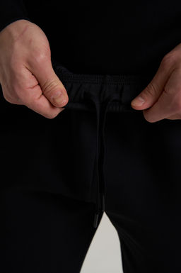 Брюки трикотажные Черный ANTA TRN Knit Track Pants фото 8