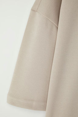 Buyuk Beden Tas Oversize/Genis Kesim Triko Bantl? Dokulu Pike T-Shirt TMNSS25BF00021