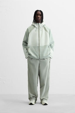 TECHNICAL TROUSERS WITH SIDE PANEL