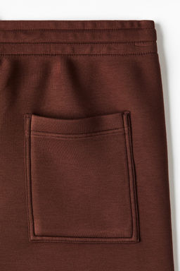 Pantal?n corto efecto neopreno Relaxed Fit - H&m фото 7