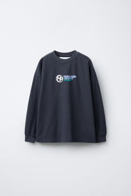 T-SHIRT WITH RAISED SLOGAN