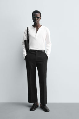 LOOSE-FITTING FLARED TROUSERS