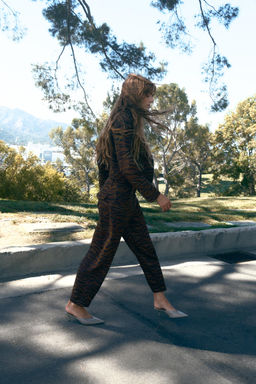 ANIMAL PRINT BARREL TROUSERS