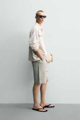 CAMISA RELAXED FIT ESTAMPADO FLORES / Blanco