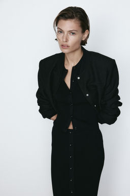 Top de canale con cuello camisero