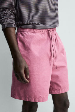 BERMUDA LAVADA REGULAR FIT / Rosa