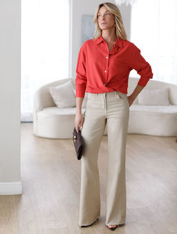 Джинсы клеш с прорезями и необработанным краем из эластичного денима средней плотности - Vilatte фото 4