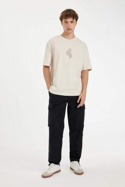 Широкие брюки-парашют с грузовыми карманами