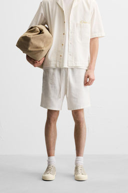 EMBROIDERED TEXTURED BERMUDA SHORTS - Zara фото 11