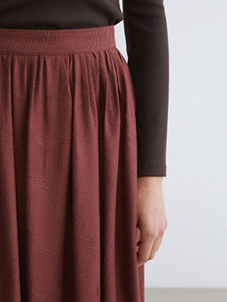 Beli Lastikli Desenli Klo? Etek