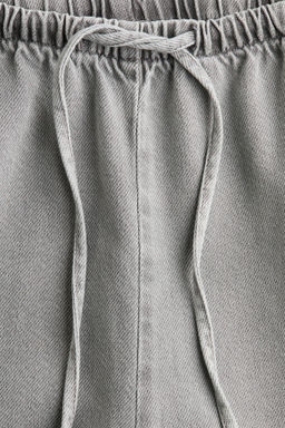 Pantal?n denim con cord?n de ajuste - H&m фото 9